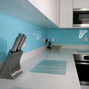 blue glass bespoke kitchen splashback