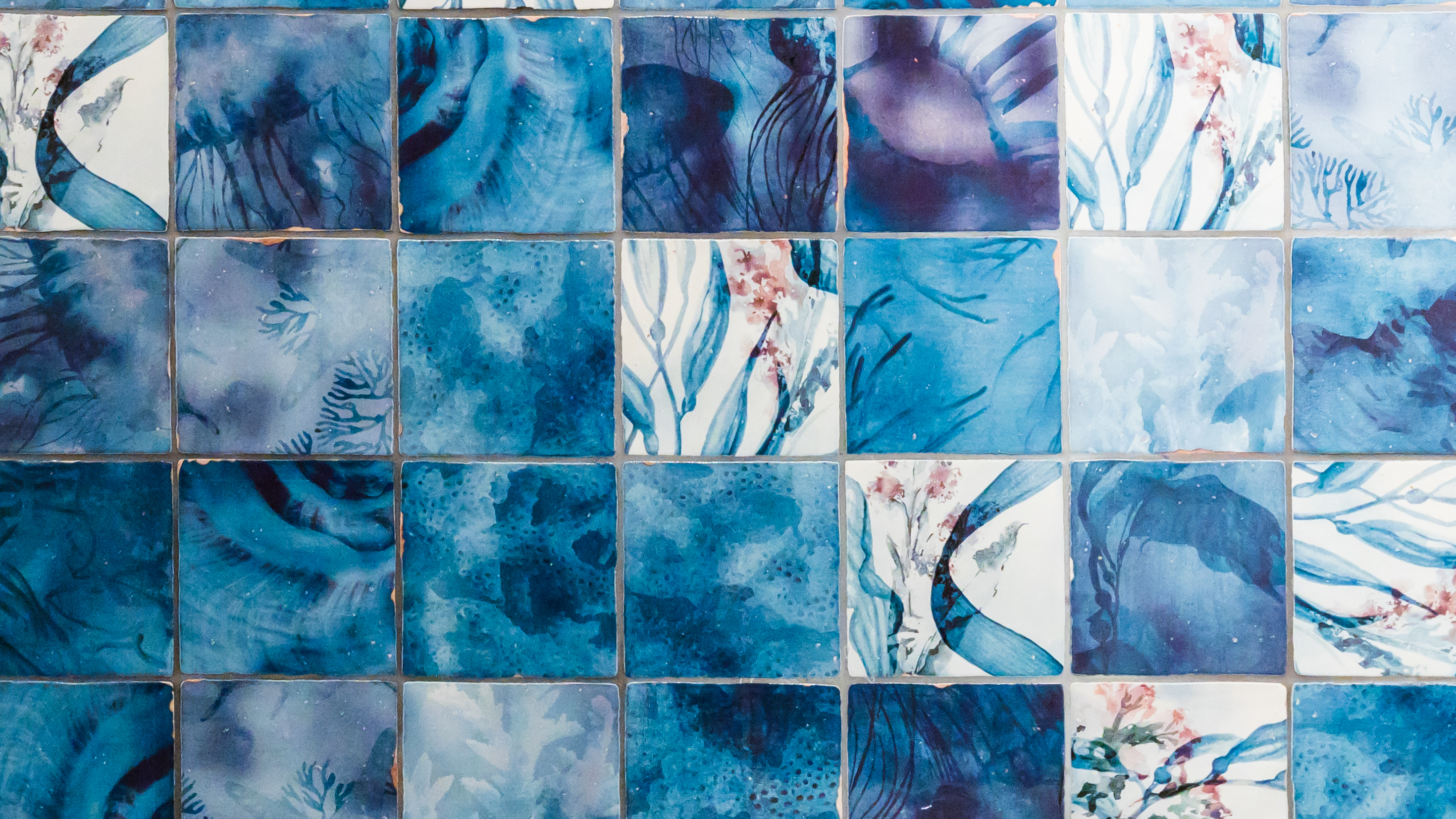 Blue patterned tiles with a floral print