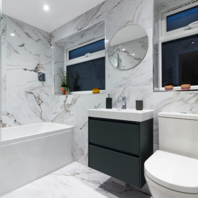 Marble bathroom with green Ona furniture