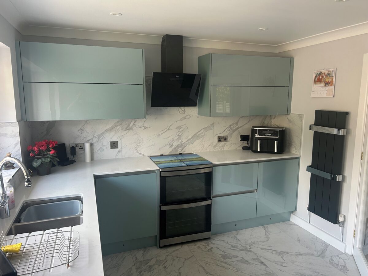 metallic blue kitchen with quartz worktop