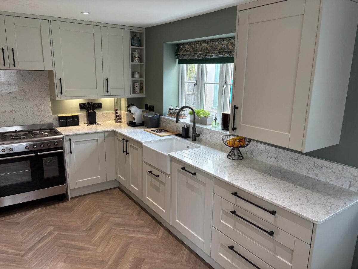 mussel kitchen cupboards with black handles