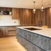 Metallic rock kitchen island with quartz worktop in urban halifax kitchen