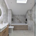 Elegant Marble Effect Bathroom with Warm Wood Accents