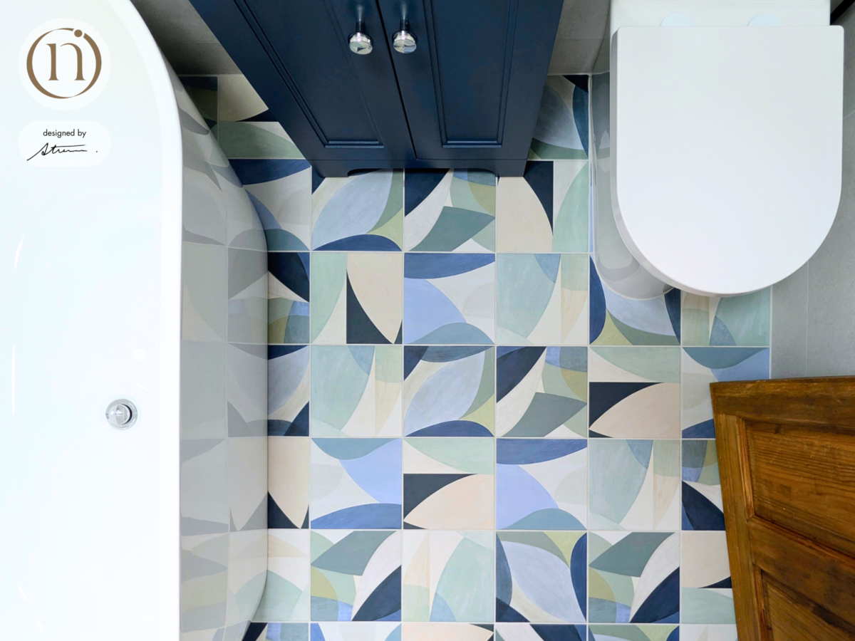 azure coastal bathroom with decorative tiles