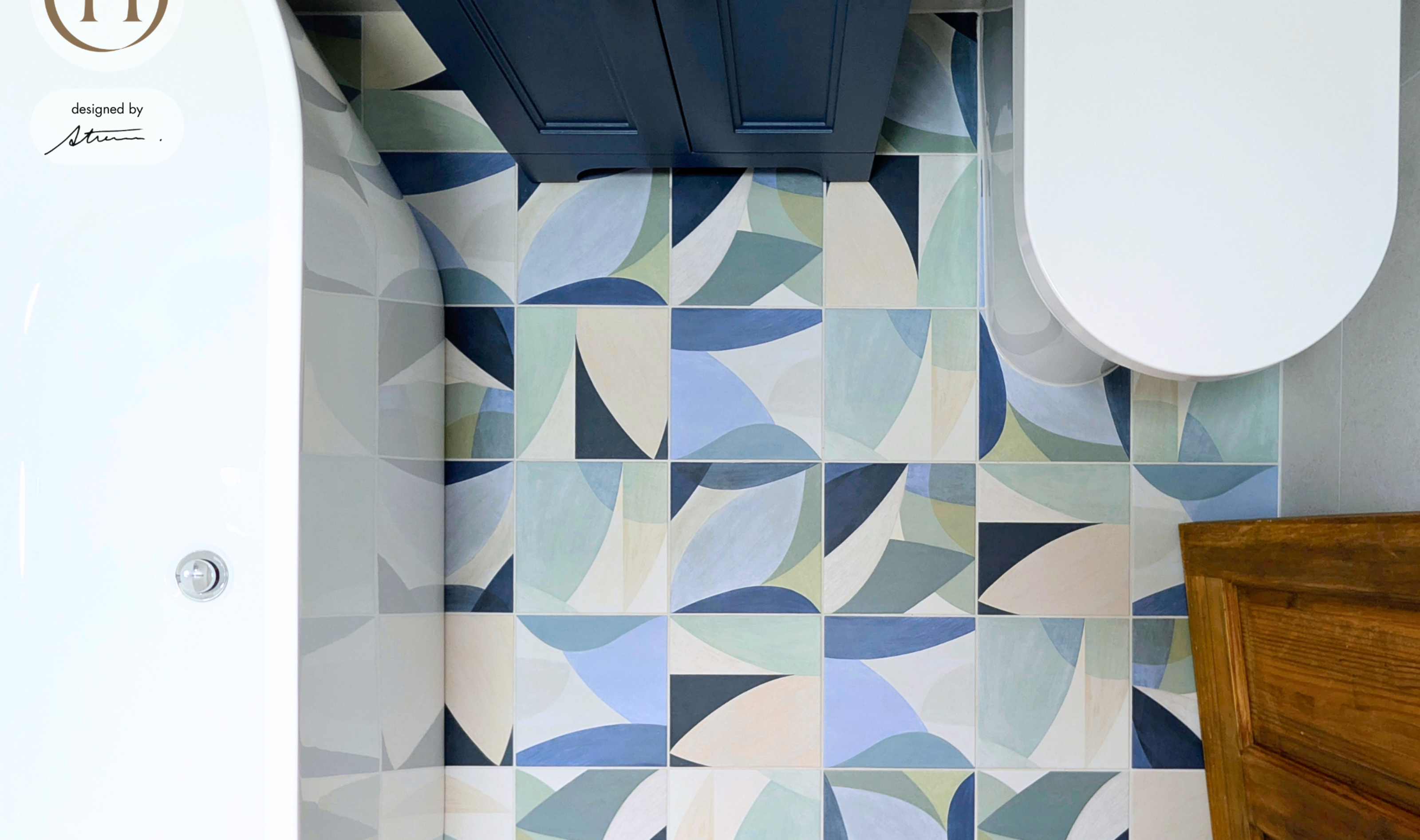 azure coastal bathroom with decorative tiles