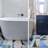 coastal bathroom with freestanding bath