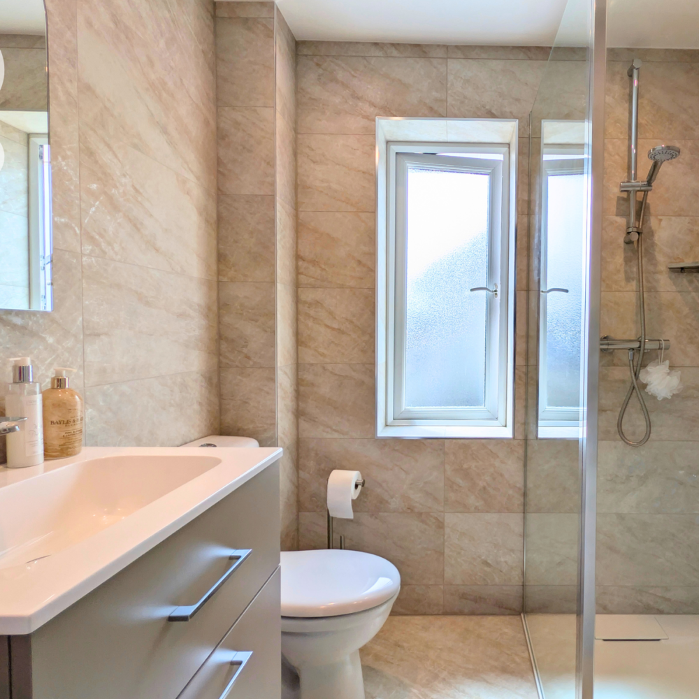 neutral bathroom design with beige tiles