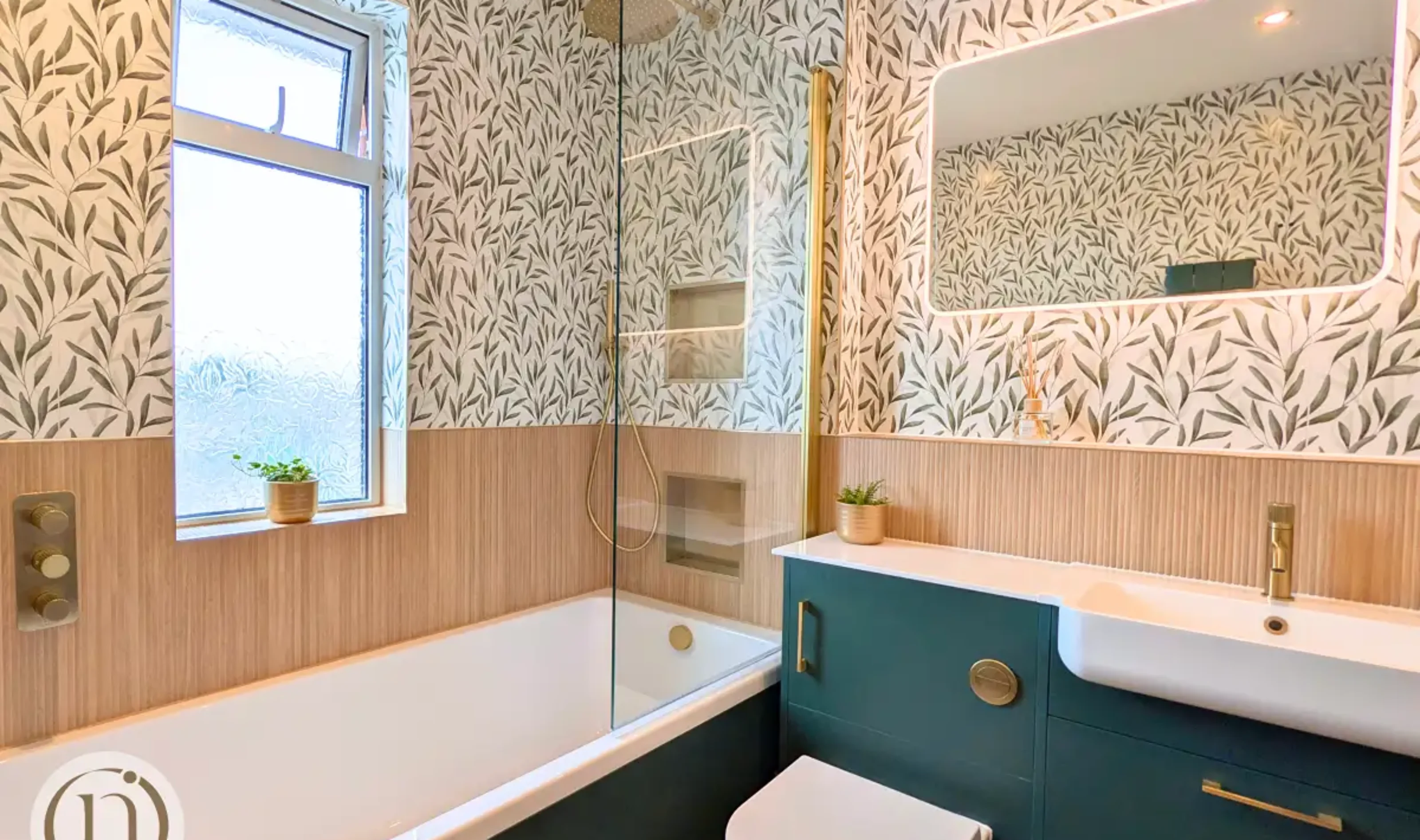highland green bath with brushed brass fittings